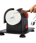 Heavy Duty Mini Bench Grinder With Dual Grinding Wheels For Precise Tool Sharpening And Burr Removal Electric Tabletop Machine in use sharpening a knife.