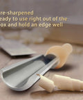 1 Inch Cryo Treated M2 HSS Roughing Gouge For Woodturning Pre Sharpened Spindle Chisel resting with wood shavings.