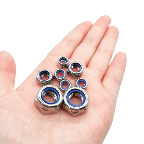 Heavy Duty 20 Pack M6 Nylon Lock Nuts Solid As A Rock 304 Stainless Steel Hex Fasteners on a hand, showing different sizes.