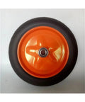Built Tough 14 Inch Hella Durable Solid Rubber Caster Wheel For Heavy Duty Industrial Trolley And Mining Cart Replacement Knockout High Load Swivel Plates, top view of orange wheel with black rubber tire.