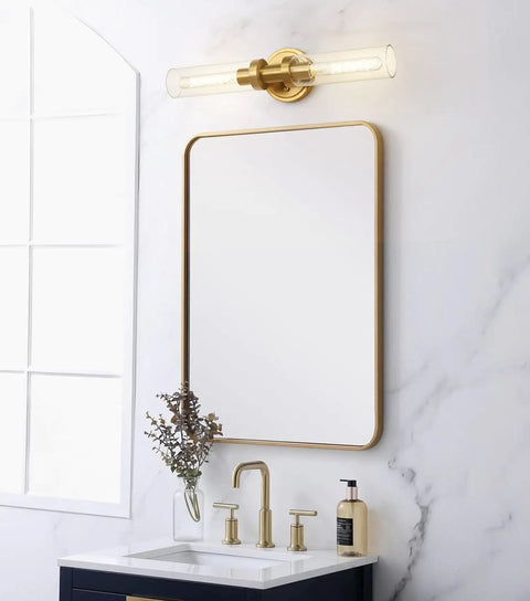 Brushed Gold Bathroom Vanity Light Fixture 2 Light Dope Modern Wall Sconce with Clear Glass Tubes over a mirror