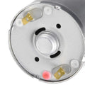 Close-up of High-Speed 9V DC Micro Motor for DIY RC Cars, showing end view with durable gearbox and metal components.