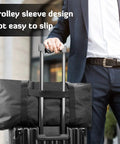 Beefy 56L 24Inch Sports Duffel Bag Set with Upgraded Zipper, water-resistant, shown on luggage trolley, focus on trolley sleeve.