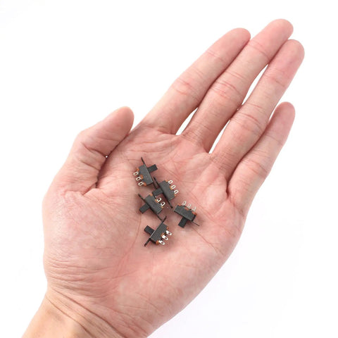 Compact 1P2T SPDT Slide Switch 5mm Panel Mount Vertical Knob, DIY Friendly For Breadboard, PCB, And Arduino Projects, SS12F15 DIP Miniature Through-Hole Toggle Switch, five black switches in hand