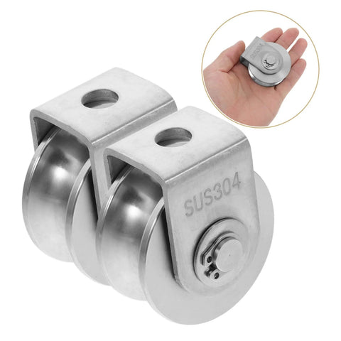 2-Pack Heavy Duty Stainless Steel Pulley Wheels For Sliding Doors And Wire Rope Lifting, shown in hand for scale