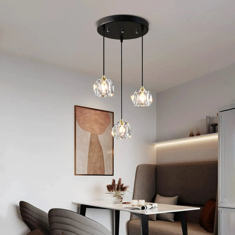 Three Light Crystal Chandelier With Dimmable LED Lighting for kitchen island, clear glass shade, dining room setting.
