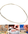 Soldering Wire Pro Grade Low Melting Point For Jewelry Making And Copper Welding displayed with jewelry tools.