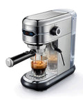 Straight Ahead Stainless Steel Coffee Maker Paired With A Semi Automatic Espresso Machine, brewing espresso in a clear glass.