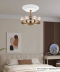 Heavy Duty Electric Hoist Lift System For Chandeliers 2 In 1 Switch Holds 110 Lbs White Metal chandelier in bedroom setting.