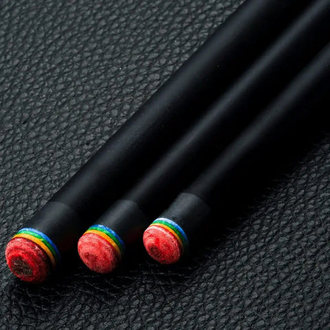 Beast Mode Carbon Fiber Pool Cue Featuring Maple Shaft Technology And Anti Vibration Foam Core For Sweet Cue Ball Control And Killer Break Shots Includes Tip Bumper Choose Size, close-up of tips on black leather.
