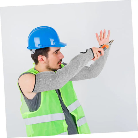 Man wearing Tough As Nails Cut Resistant Arm Sleeves With Thumb Hole Grip, using tools in a safety vest and helmet.