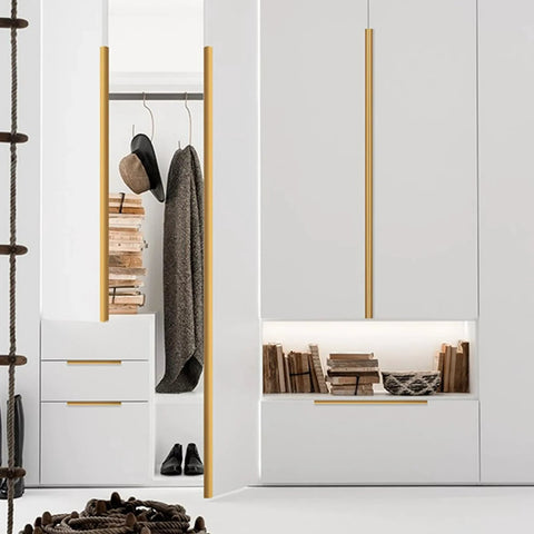 Brushed Gold Aluminum Alloy Concealed Drawer Pulls 2 Pack For Cabinets And Doors, 80mm Flat Finger Pull With 64mm Hole Spacing, installed on white cabinets.