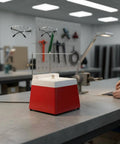 Diamond Glass Grinding Machine With Auto Cooling And Baffle on a workbench, showcasing its detailed design for polishing glass.