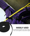 Total Game Changer For Wire Management And Cord Organization Using Hella Tough Reusable Self Gripping Cable Ties Great For Garage Home Office And Outdoor Projects Comes In 2 Rolls, organizing purple and yellow wires.