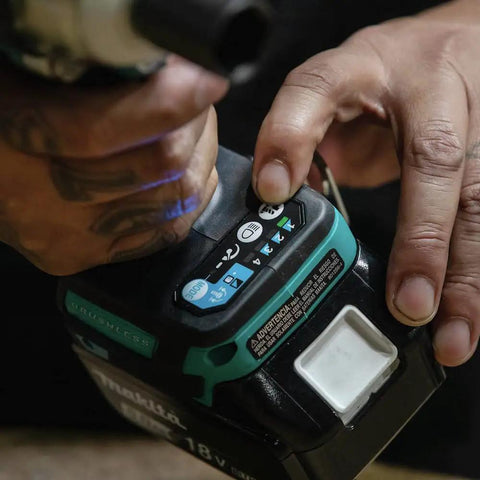 Close-up of speed settings on 18V LXT Brushless Cordless Three Eighths Inch Drive Impact Wrench with Friction Ring Anvil