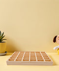 Top Tier Solid Wood Jewelry Tray Organizer Designed To Keep Your Bling Neatly Arranged In 36 Grids For Bracelets Necklaces And Earrings While Traveling Or Stashing On Countertops, showcased against a yellow backdrop.