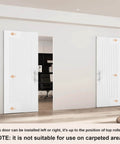 Installed 36x84 Concealed Barn Door With Soft Close Hardware Kit in a living room, showing the 1 Panel Reeded design.