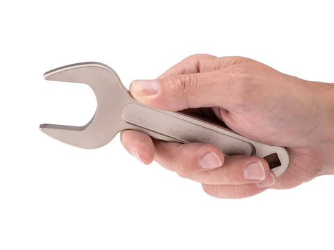 Hand holding a 30 mm Service Wrench With 15-Degree Angled Head And Drive Square, Short Handled Access Wrench For Tight Spots, Tekton Quality