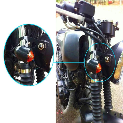 Chrome metal motorcycle turn signal mounting brackets, 30–45mm clamp size, pair installed on front forks.