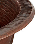 Close-up of Dual Mount Handmade Pure Solid Copper Bathroom Sink In Aged Copper Finish, Fifteen And A Half Inch, With Dual-Flex Rim Design And Artisan Craftsmanship For A No Brainer Upgrade, showing textured rim and copper detail.