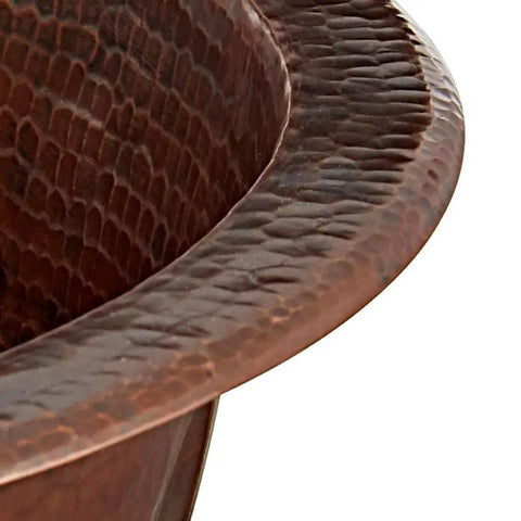 Close-up of Dual Mount Handmade Pure Solid Copper Bathroom Sink In Aged Copper Finish, Fifteen And A Half Inch, With Dual-Flex Rim Design And Artisan Craftsmanship For A No Brainer Upgrade, showing textured rim and copper detail.