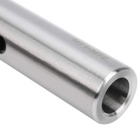 Close-up of a silver taper drill sleeve adapter in high-speed steel with hollow bore
