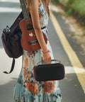 Person carrying a Durable Oxford Microphone Case For JBL Wireless Two Mic System Grab And Go Mic Storage Portable Box Color A
