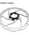 Installation display of Centerlock To Six Bolt Rotor Adapter With Lockring All In One Kit for MTB and Road Bikes in black.