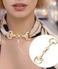 Elegant woman wearing a scarf with Six Piece Set Medium Horse Bit Buckles D Ring Gold Snaffle Buckles Perfect For Women Must Have