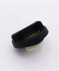 Side view of Hyundai And Kia Engine Oil Filler Cap Replacement 26510-26611, black plastic cap with yellow lettering.