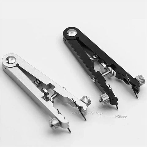 Black and silver pin remover tools from 5 Piece Watch Repair Kit For Bands And Spring Bars, Disassembly and Assembly.