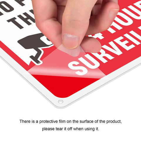 Removing protective film from Heavy Duty 14X10 Inch No Dumping Signs 2 Pack Of Rustproof Aluminum Weather Resistant.