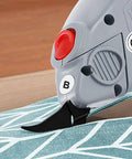 MXBAOHENG Blunt Blade Cutting Head For Wbt 1 Electric Fabric Scissors Heavy Duty Cloth Cutter, close-up on blunt edge cutting fabric.