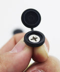 Fifty Pack Plastic Screw Cover Set Delivers Knockout Finish For Furniture And DIY Builds No Sweat Setup Universal Fit Hidden Fastener Cap held in hand showing interior screws.