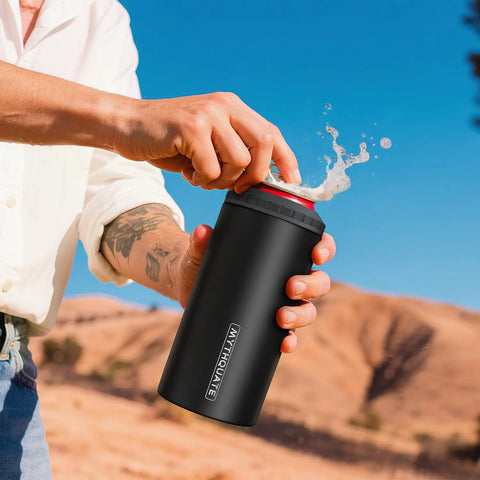 Person using 3 In 1 Slim Can Cooler For 12 Oz Skinny Cans Regular Cans And Beer Bottles Keeps Drinks Cold Up To 6 Hours With Double Walled Stainless Steel Vacuum Insulation No Sweat Matte Black Finish outdoors.