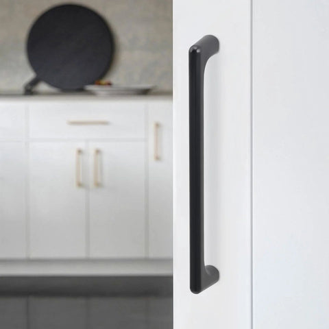 Ten Pack 5 Inch Matte Black Cabinet Pulls for Kitchen Cabinets, shown installed on a white kitchen cabinet