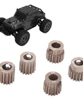 Miniature off-road vehicle model with adjacent steel gears for electric bike chain and power transmission.