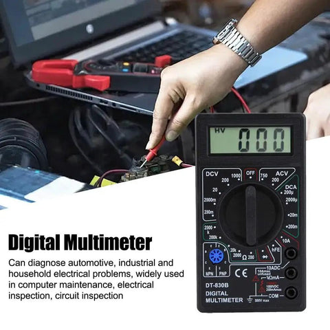 Pocket Size Digital Multimeter With LCD Auto Range for voltage testing in automotive diagnostics, shows hand using meter