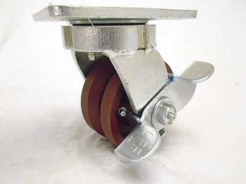 4 Inch Swivel Caster With Burgundy Ductile Steel Wheel And 7/8 Inch V Groove Offers 1500 Lbs Capacity, side view with locking brake.