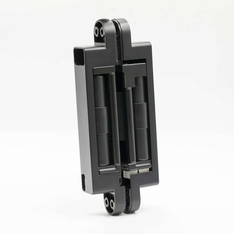 Heavy-Duty Self Soft-Closing Hidden Door Hinge for Commercial and Residential Doors, matte black, concealed metal hardware.