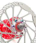 Rad Ultra Lightweight M5x10 Titanium Disc Brake Bolts With Torx T25 Drive And Anti Vibration Rubber Inserts on rotor hub