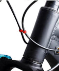 Multipurpose Alloy Bicycle Brake Line Clamps And Cable Clips For Road Bikes No Tool Needed Easy Install Cable Management Secure Grip Anti Loosening Support Universal Bike Accessories For Wires And Cables installed on bike frame, securing cables in place.
