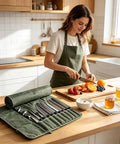 Pro Grade Heavy Duty Waxed Canvas Knife Roll Case For Chefs on kitchen counter with woman slicing citrus fruits