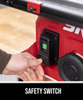 Close-up of the safety switch on the Built Tough 15 Amp 8 1/4 Inch Compact Table Saw With Quick Release Folding Stand.