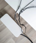 Spiral Cable Wrap Kit for Easy Cable Management 1.5 Meter Length 22mm Diameter White Flexible PE Sleeve in use under desk