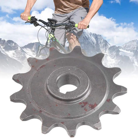 Beefy 13 Tooth Aluminum Gear Sprocket for Universal Chains with cyclist in background and mountain view