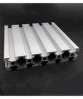Badass 20100 Aluminum Extrusion With Hella Clean Cable Routing Slot For CNC And 3D Printer Rigs T Slot Wire Channel Profile, showing 20x100mm cross-section.