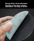 Get The Ultimate 100pc Wet And Dry Sanding Discs Perfect For Random Orbital Sanders With Super Durable Hook And Loop Backing In Grits Ranging From 60 To 2000 For Total Makeover Jobs, showcasing the strong sticky velvet adsorption on the back.