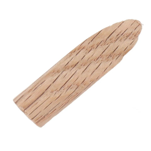 Close-up of a single softwood plug from the 50 Piece Pocket Hole Plugs Woodworking Dowel Kit Built Different.