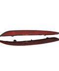 Sleek Red Rear Bumper Reflectors For Tesla Model 3 2017 Through 2022 Clean Lines Left And Right Turn Markers Replace Lens Trim Oem 1077406-00-F And 1077407-00-F viewed from above, showcasing shiny red plastic with detailed surface texture.